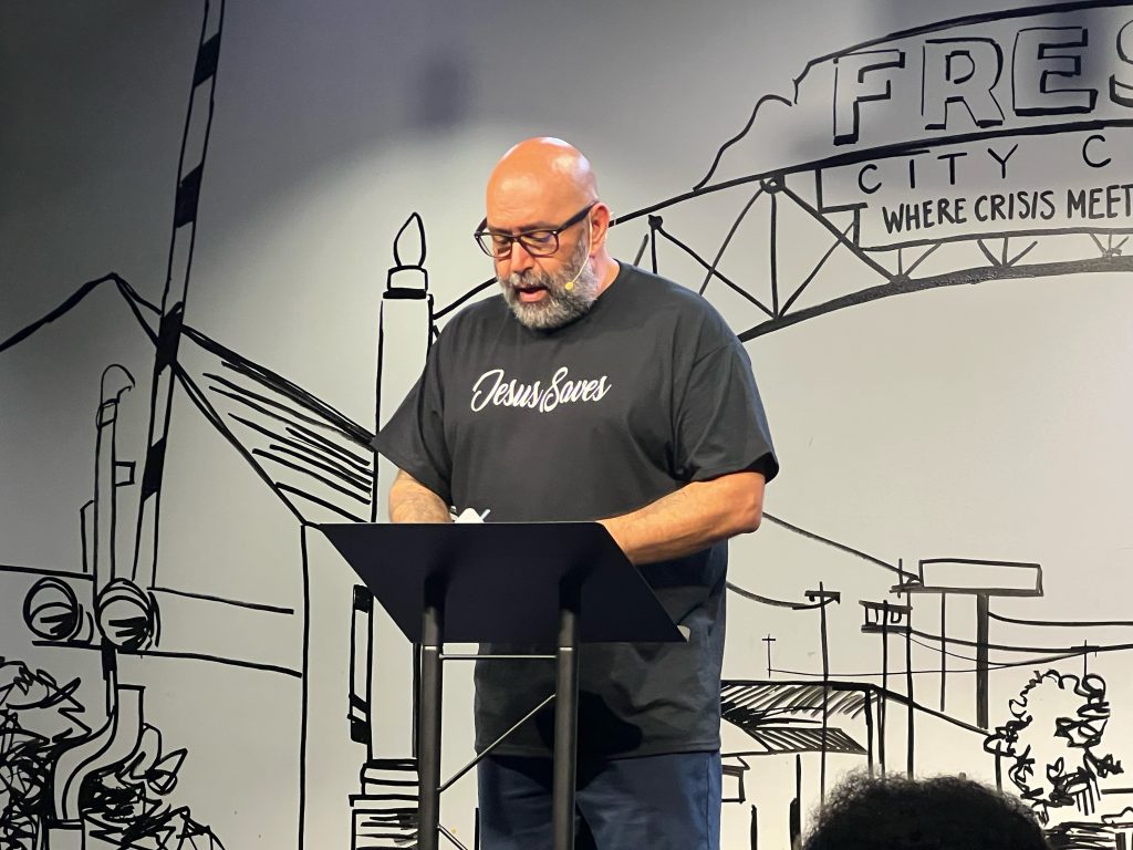 Pablo given a sermon at City Church Sunday service.
